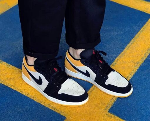 AJ1 black and yellow toes